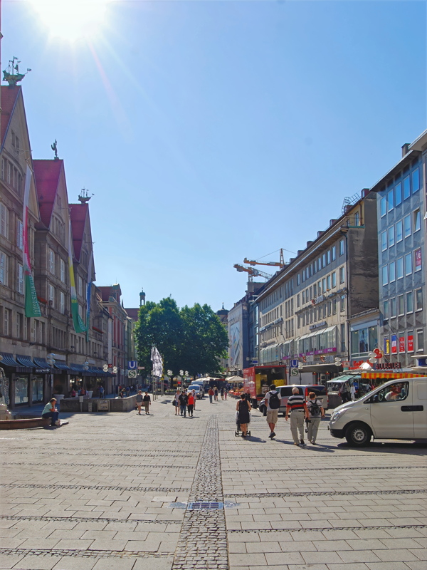 A sunny day on the pedestrian shopping street Neuhauser Straße in Munich, Germany